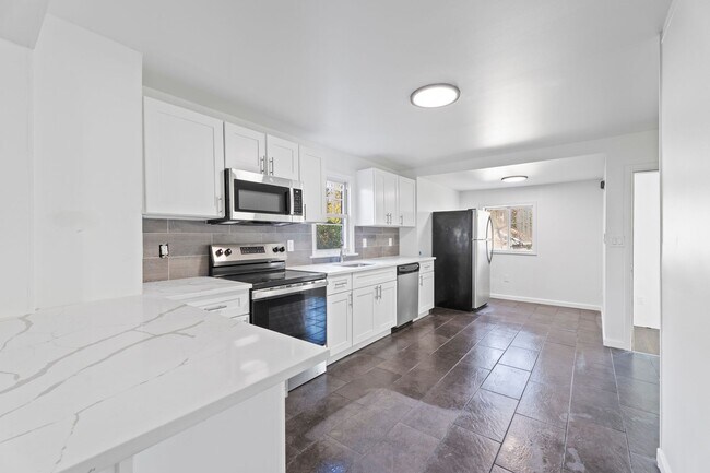 Building Photo - Welcome Home to a 2 bath 4 bedroom  home