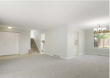 Main Floor Living Room and Dining Room to the Right - 18863 east milan