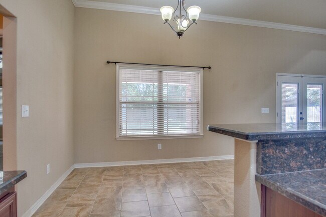 Building Photo - Twelve Oaks Plantation Home with Hardwood Floors, Fireplace & Fenced Backyard
