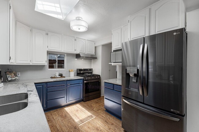 Building Photo - Central Novato Home with Large Yard and A/C!