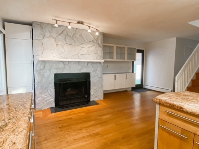 Fireplace off Kitchen Island - 339 Main St