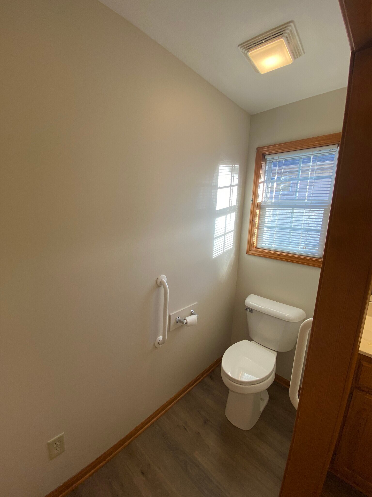 Primary bathroom with handicap bars - 3906 SW Chartwell Ct
