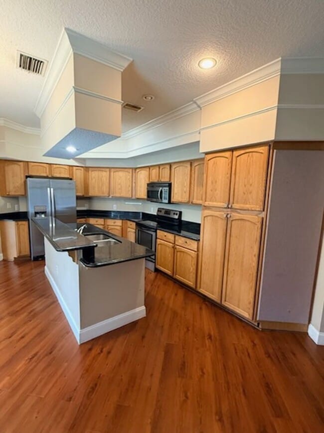 Building Photo - 4BR/3BA | Updated Single Family Home | 3-Car Covered Parking | Inground Pool!