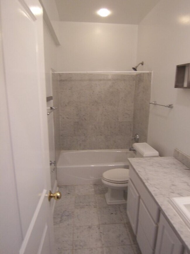 Building Photo - Be Majestic at the Majestic Condominiums! ...