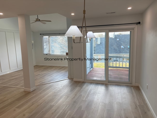 Building Photo - Fully Redesigned Townhouse Style Condo For Rent in Desirable Louisquisset Community!