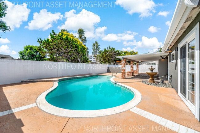 Building Photo - Brand New Remodel – Stunning Pool Home wit...