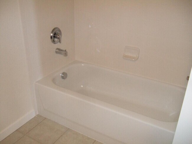 Building Photo - "Spacious 3-Bedroom Denver Condo with Cozy Fireplace & Modern Comforts!"