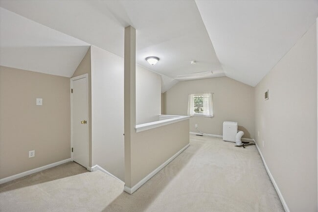 Building Photo - Available Immediately – 4 Bedroom End-Unit...