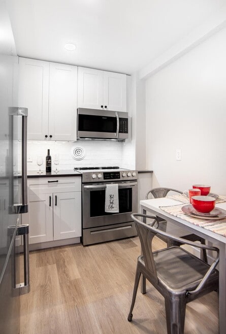 Premium Package: Kitchen in the Tier 03 Studio - Circle Arms Apartments