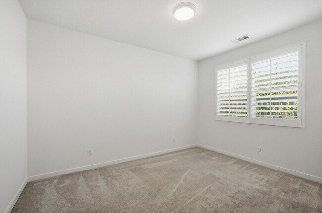 Building Photo - NEW LISTING 4 Bedroom, 3 Bathroom, 2 Garage Detached Condominium, with HVAC, Tankless Water Heate...