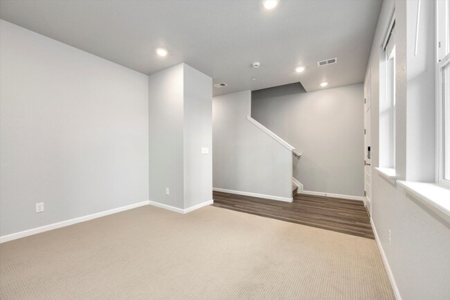 Building Photo - Gorgeous NEW Three Story Townhome with two car attached garage!