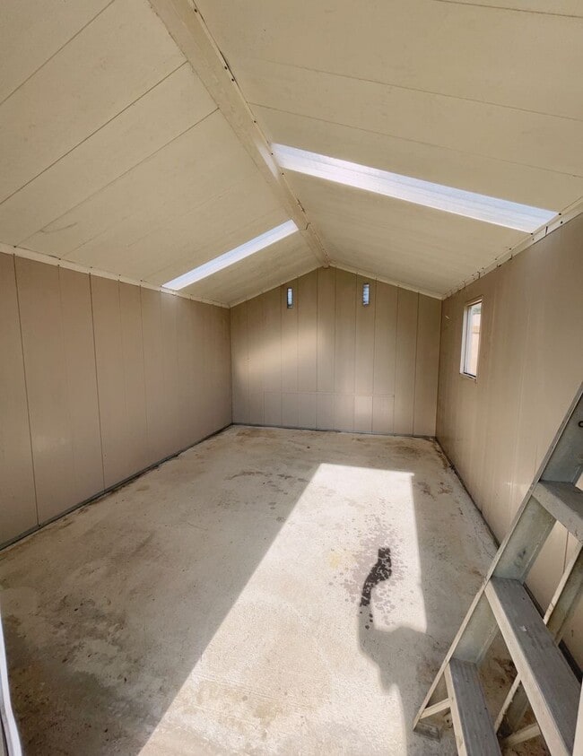 Building Photo - Fenced yard/Storage building/Close to college/Paved street