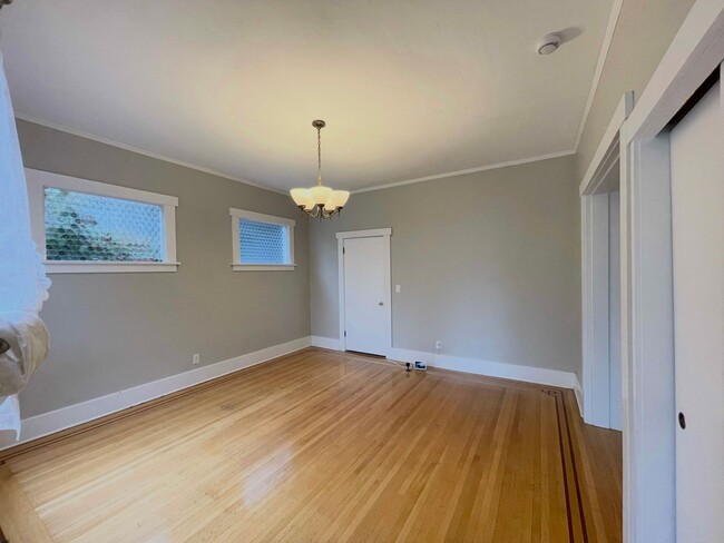 Building Photo - Elegant 4BR 2.5Bath Home with Fenced Yard & Garage Across from Seattle Prep**2 weeks free**