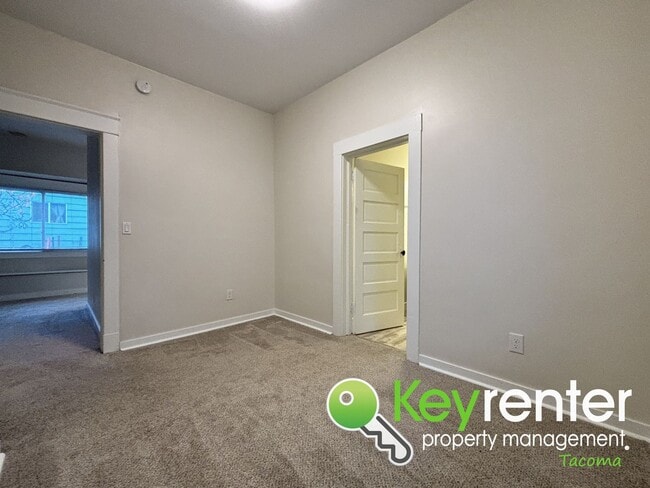 Building Photo - Newly Remodeled 2-Bedroom, 2-Bath Tacoma Home with Finished Basement, Large Backyard, and Detache...