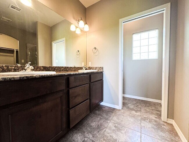 Building Photo - Spacious 4-Bed, 3-Bath Gem with 1804 Sq. F...