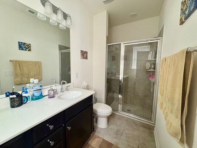 Building Photo - Scenic 3-Bed Townhome with Screened Porch, First Floor Storage & 1-Car Garage – Overlooking the G...