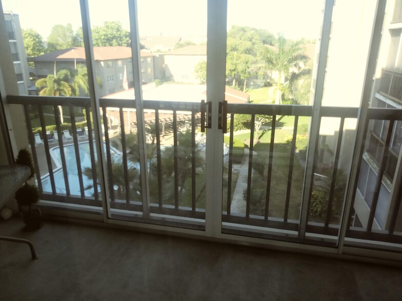 Balcony overlooking the pool - 1243 S MLK Jr Ave