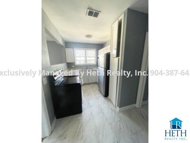 Building Photo - Riverside Apartment