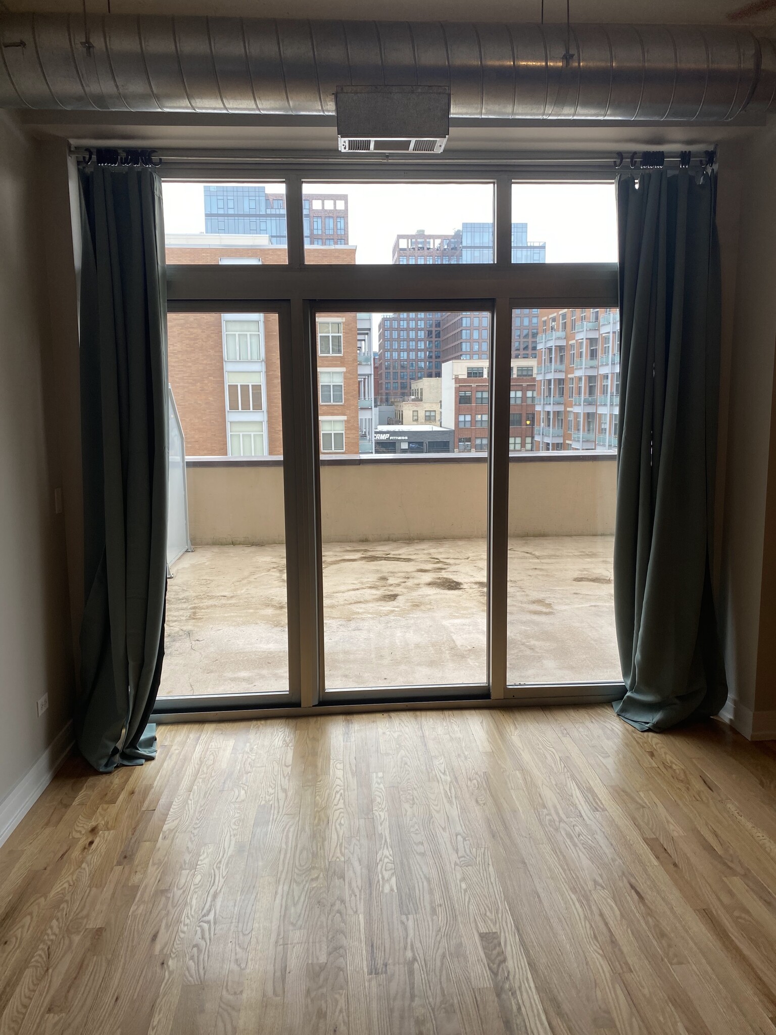 curtains and view out to private 432 SF terrace - 950 W Monroe St