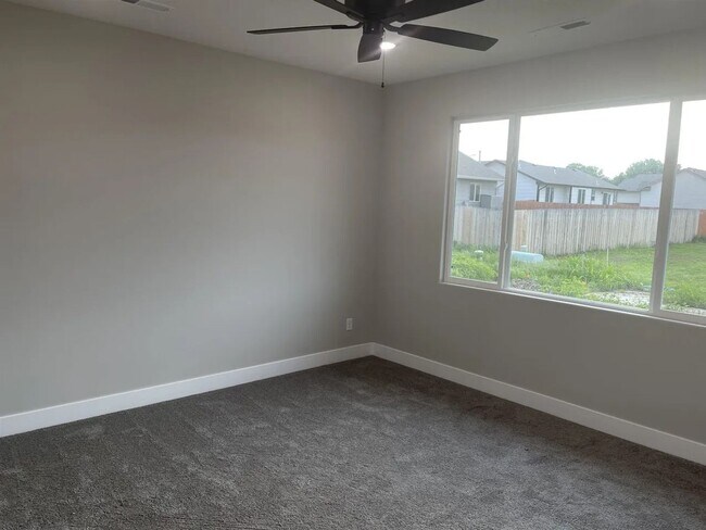 Building Photo - Single family slab home with three car garage. This home is 4 bedrooms, three bathrooms open floo...