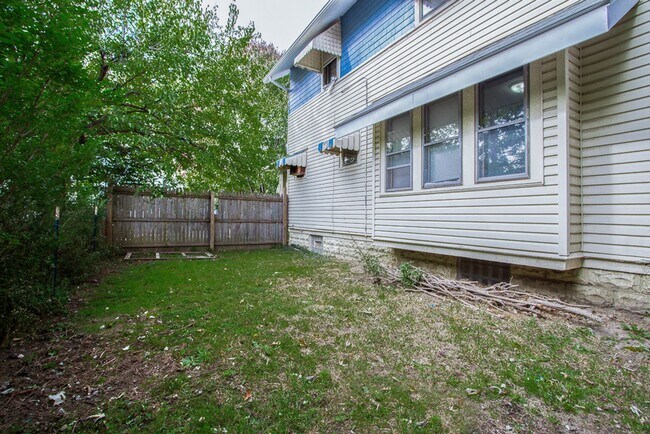 Building Photo - Charming 3BR Home with Classic Woodwork, Porch & Bonus Attic Space