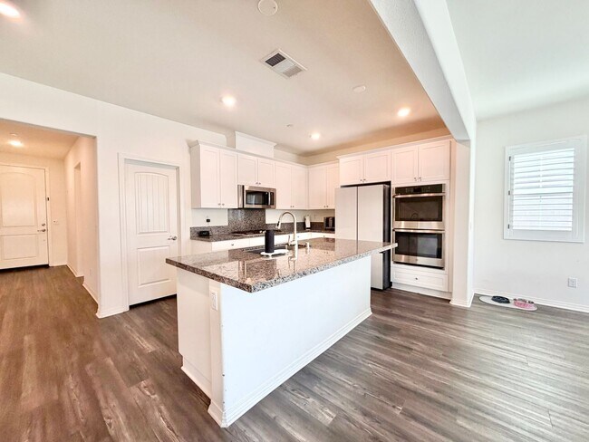 Building Photo - Spacious Heritage Lake Home with Solar & Main-Level Primary Suite