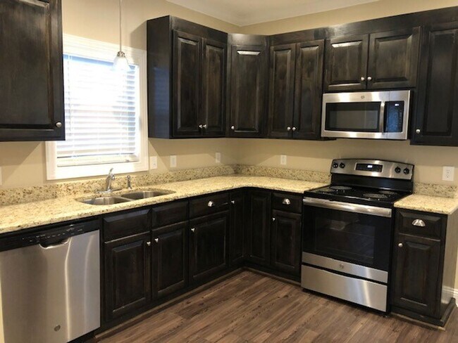 Building Photo - "Brand New Construction." Quiet location, charming, cozy 3 bedroom duplex