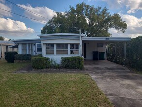 Building Photo - 55+ mobile home community. On canal to bea...