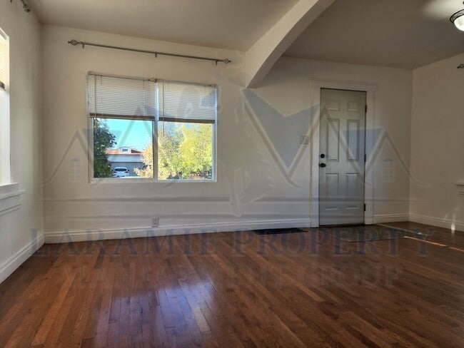 Building Photo - Charming 3-Bedroom Home with Hardwood Floo...