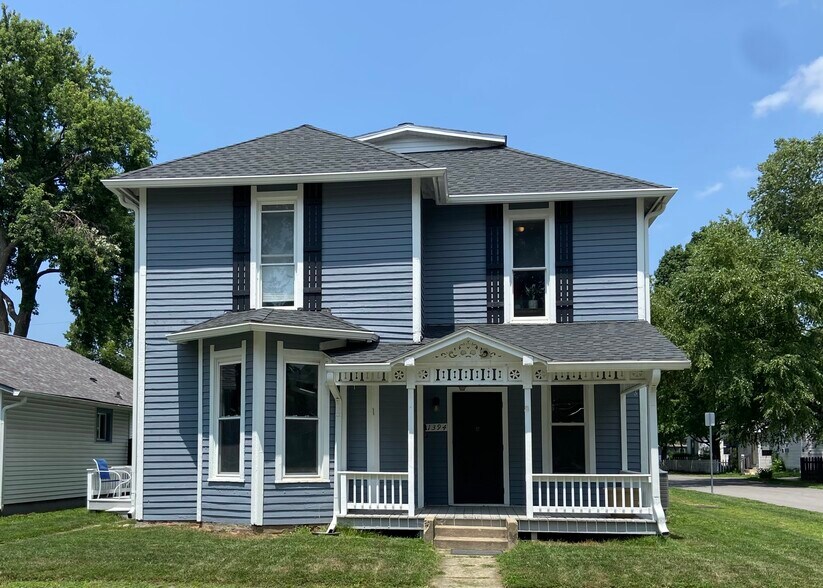 Exterior front. Entrance to unit is on left side of the house. - 1394 Wayne St