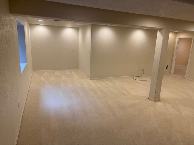 Building Photo - Spacious 4-Bedroom Ranch with Finished Bas...