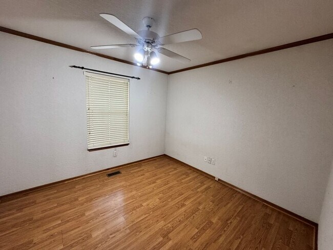 Building Photo - 4-bedroom 2 bath home in Kingsbrook, lots of storage, 2 dining areas and stand-up storm shelter! ...