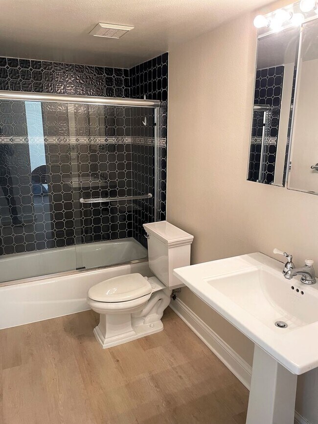 Building Photo - Bright  Upstairs Two Bedroom Condo at Strands Beach with Ocean View