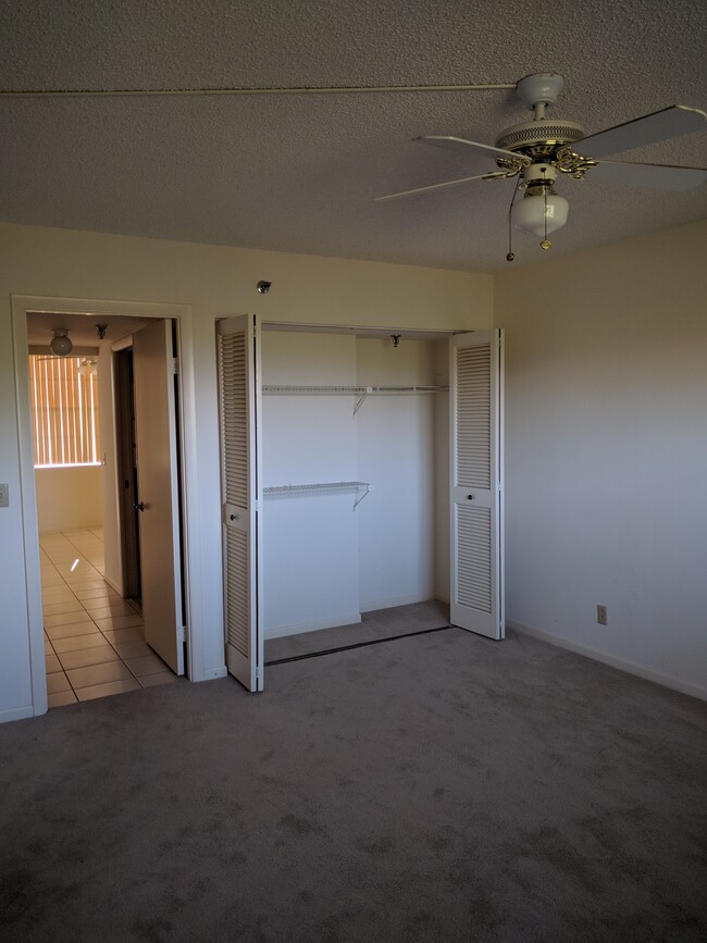 Front guest bedroom. New carpet. - 198 NW 67th St