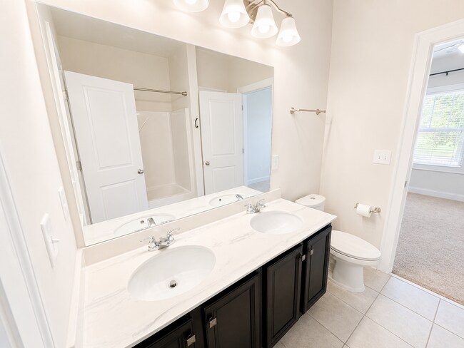 Building Photo - Better Than New | Ranch Home with Flex Room, 3-Head Spa Shower, Covered Outdoor Living & Premium ...
