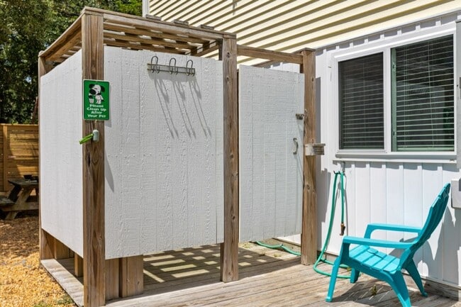 Building Photo - PRICE REDUCTION! LIVE AT THE BEACH FOR THE...