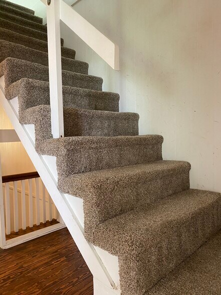 Stairs to Loft - 222 W End Blvd