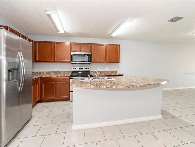 Building Photo - 5555 Maggiore Blvd