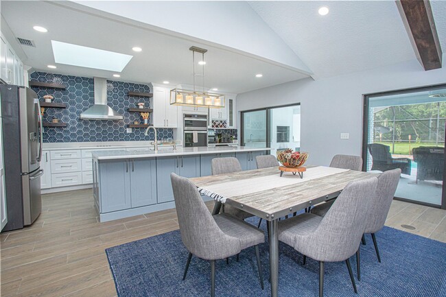 Building Photo - Beautifully Updated 3/2 Pool Home with Large Backyard in Lake Ajay (Gated Community)