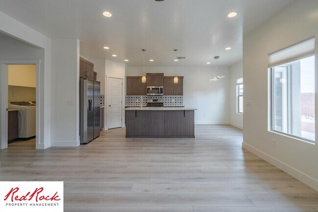 Building Photo - Comfort, Space & Style with a 3-Car Garage Small Dog Friendly!