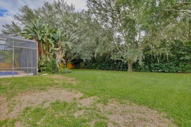 Building Photo - Stunning 4/3 Pool Home with a Bonus Room a...