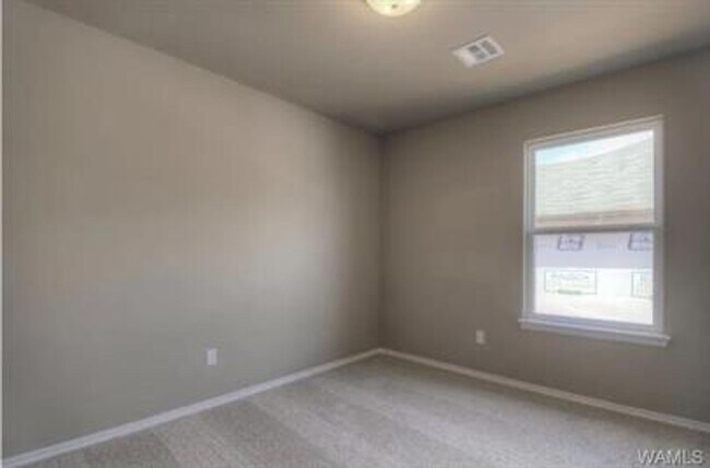 Building Photo - Stylish 4BR/2BA Home with Garage & Privacy Fence