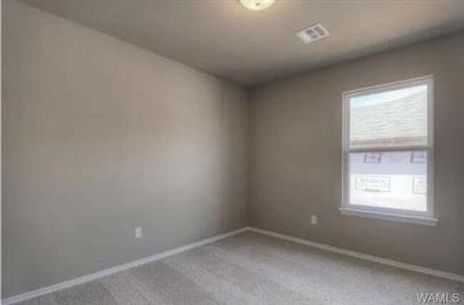 Building Photo - Stylish 4BR/2BA Home with Garage & Privacy...