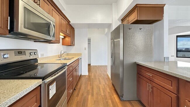 Building Photo - VIEWS from this Renovated & Spacious Apartment at Pacific Park Plaza