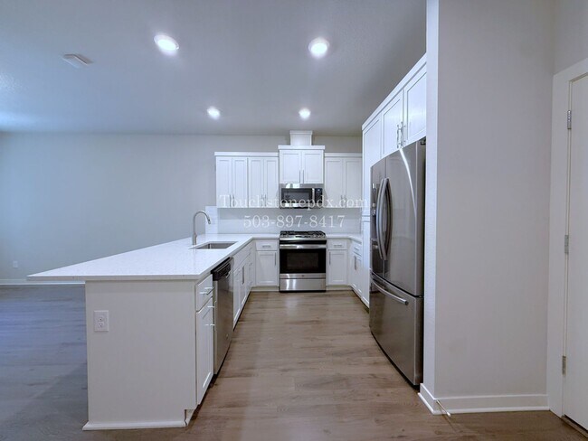 Building Photo - RECEIVE $500 OFF! READY NOW! CALL TODAY! Modern Hillsboro Townhome with AC, Electric Fireplace, a...