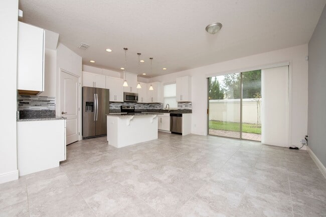 Building Photo - Two story Townhouse 2-bedroom, 2.5 bath in Eagle Creek of Lake Nona