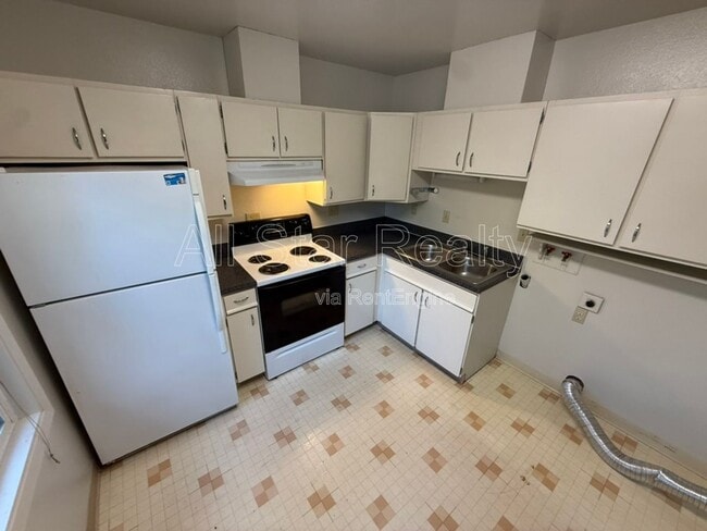 Building Photo - 5701 E 98th Ave