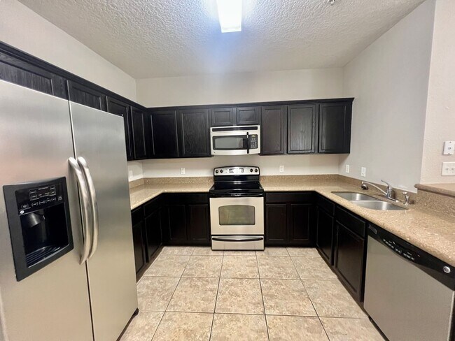 Building Photo - Stylish 3 Bedroom, 2 bath Condo with Woode...