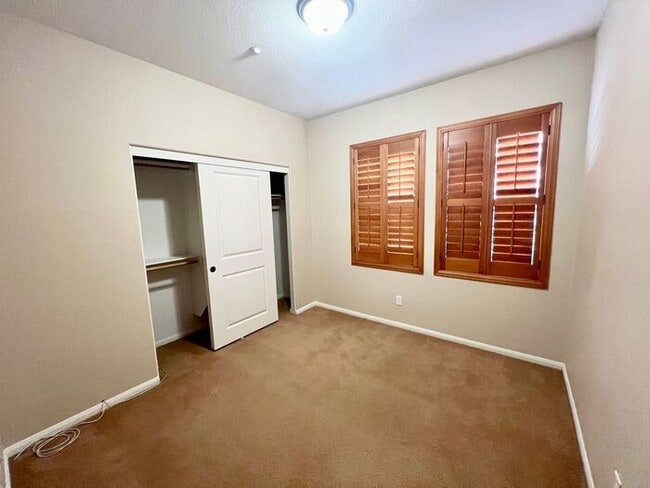 Building Photo - Resort-Style Living with Private Balcony Near Community Pools