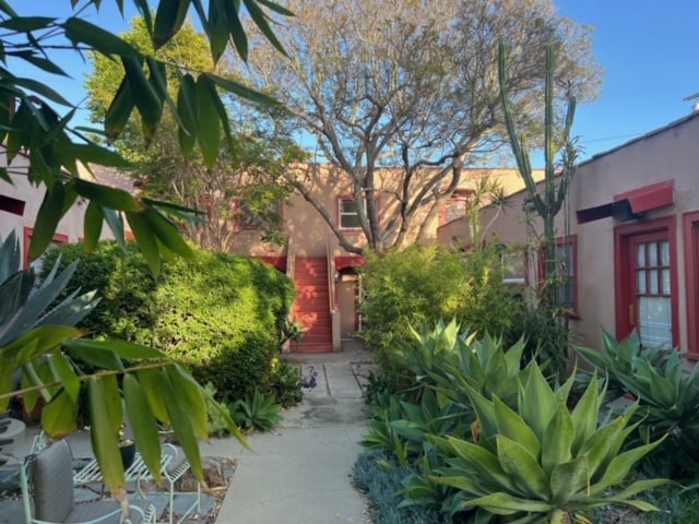 Front Yard facing back upstairs bungalows - 928 Marco Pl